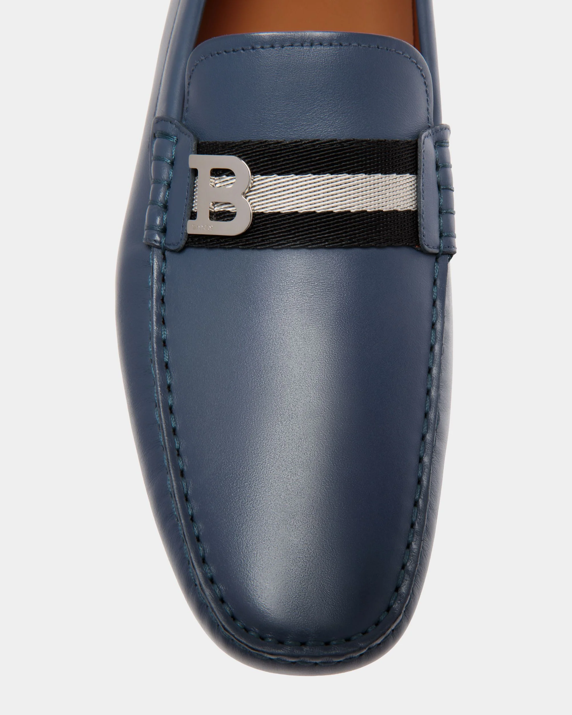 Driver In Blue Leather - Image 5