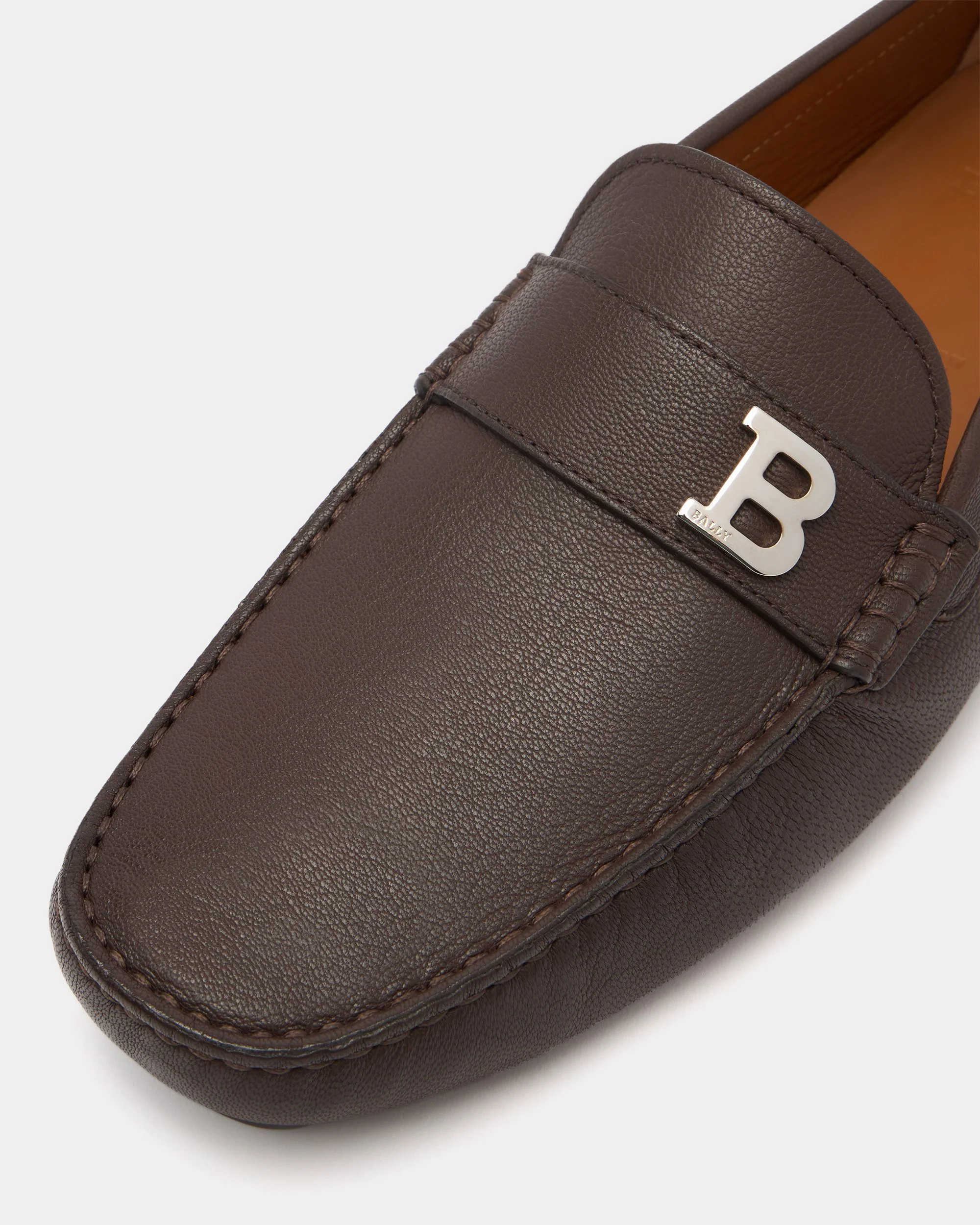 Driver In Brown Leather - Image 5