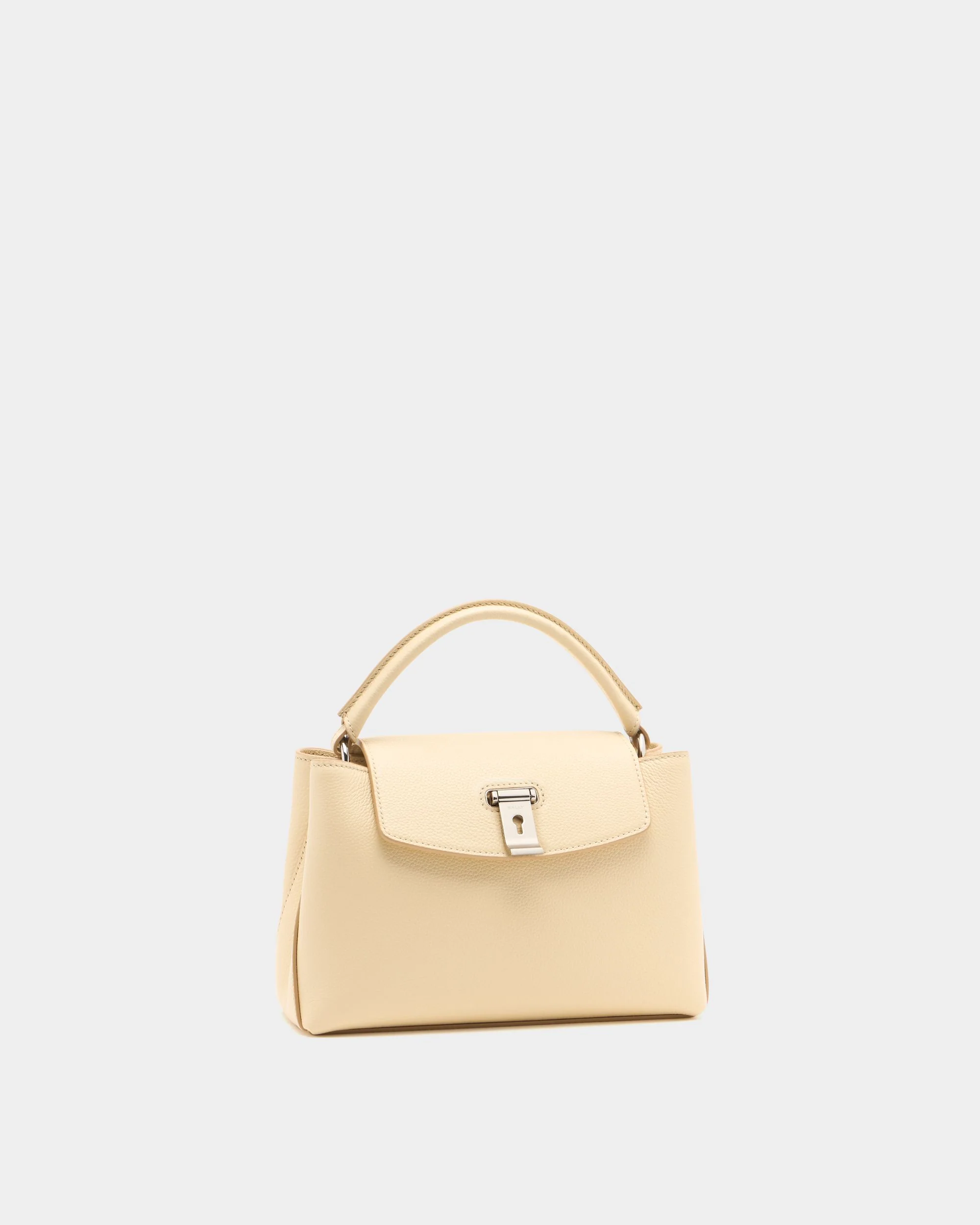 Lock Me Small Top Handle Bag in Ginger Grained Leather - Image 4