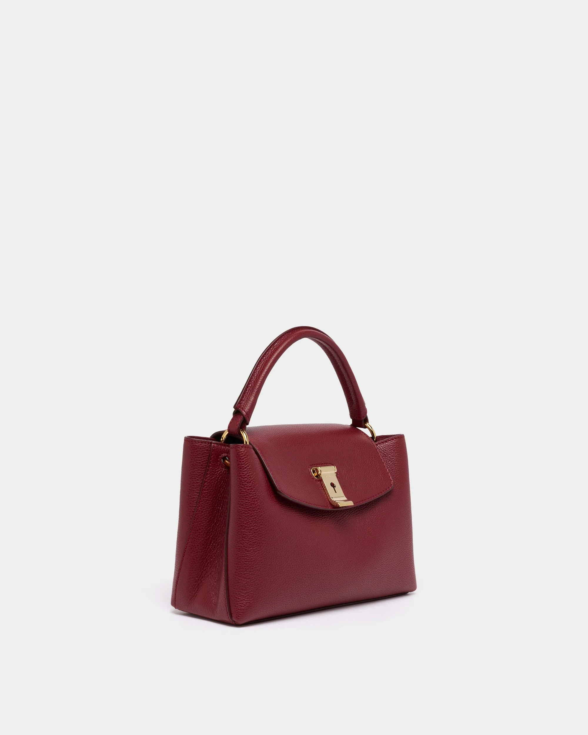 Lock Me Small Top Handle Bag in Ruby Red Grained Leather - Image 3